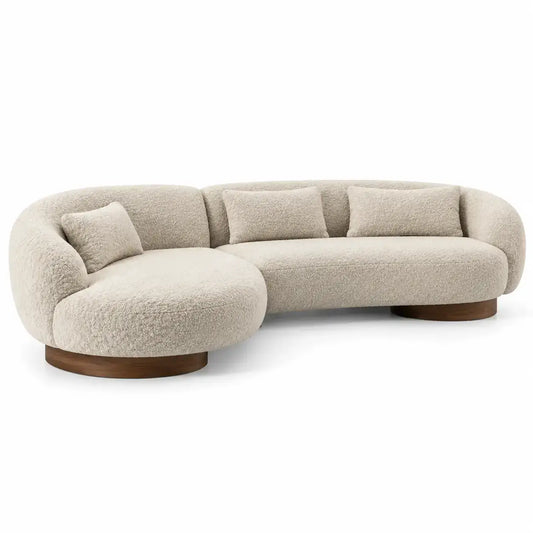 Sofá curvo tapizado de contorno redondeado, beige y marrón
