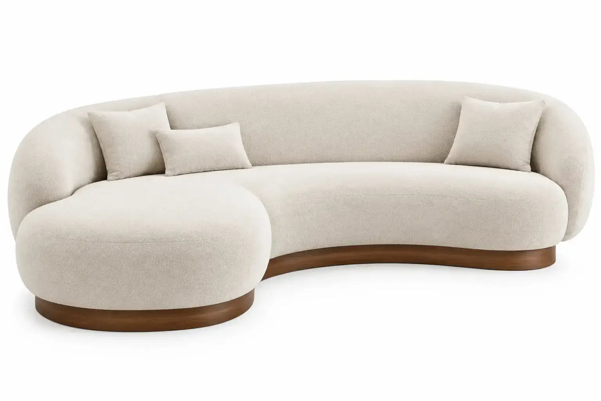 Sofá curvo tapizado de contorno redondeado, beige y marrón
